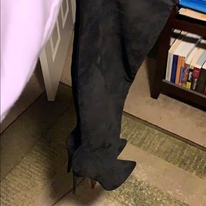 Black suede knee boots.